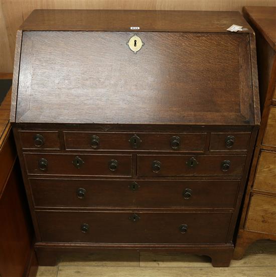 A mid 18th century oak bureau W.87cm